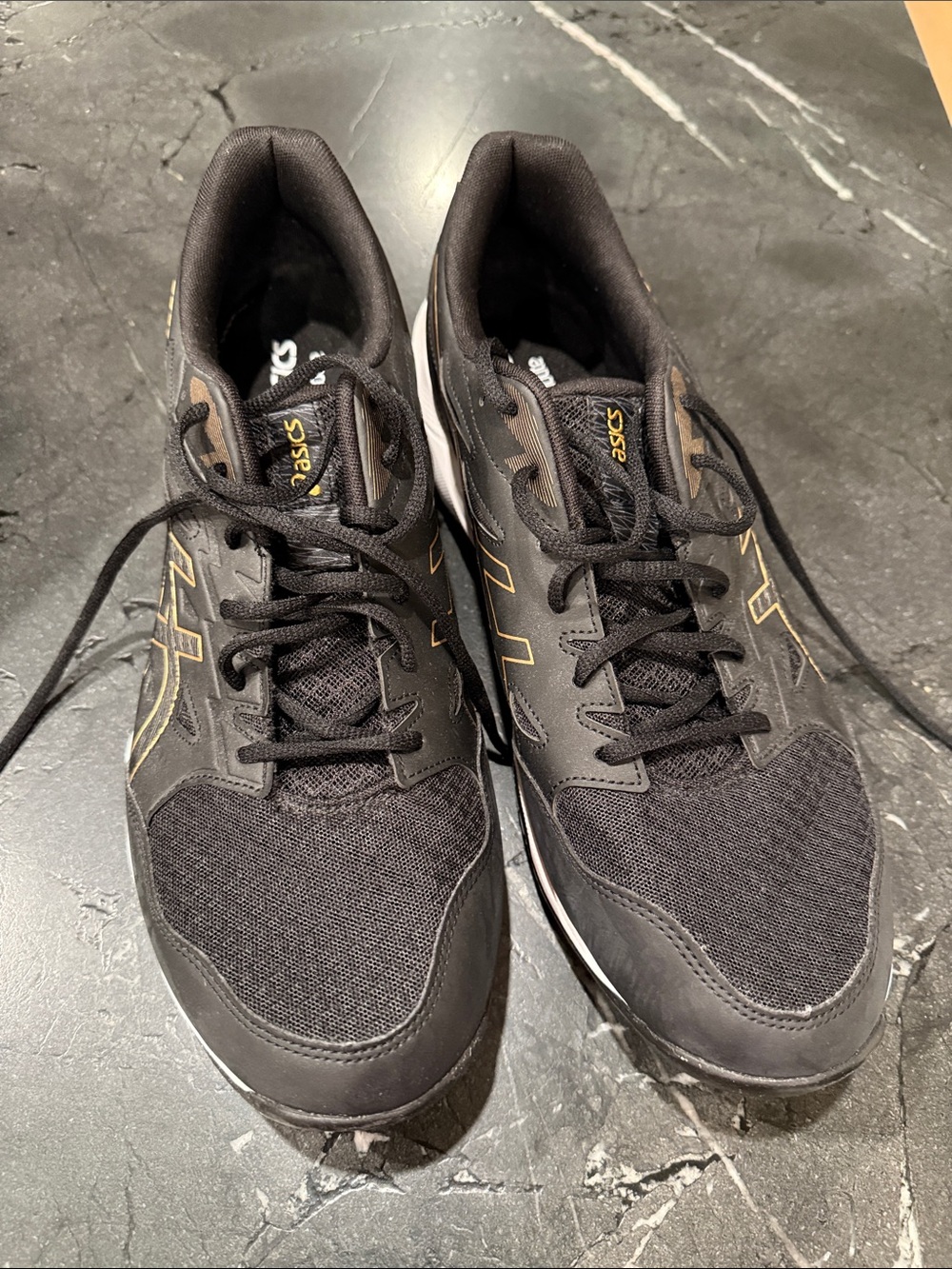 Asics Black Athletic Sneakers with Gold Detailing